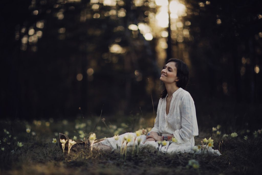a women in a serene forest, Eco-therapy settings 