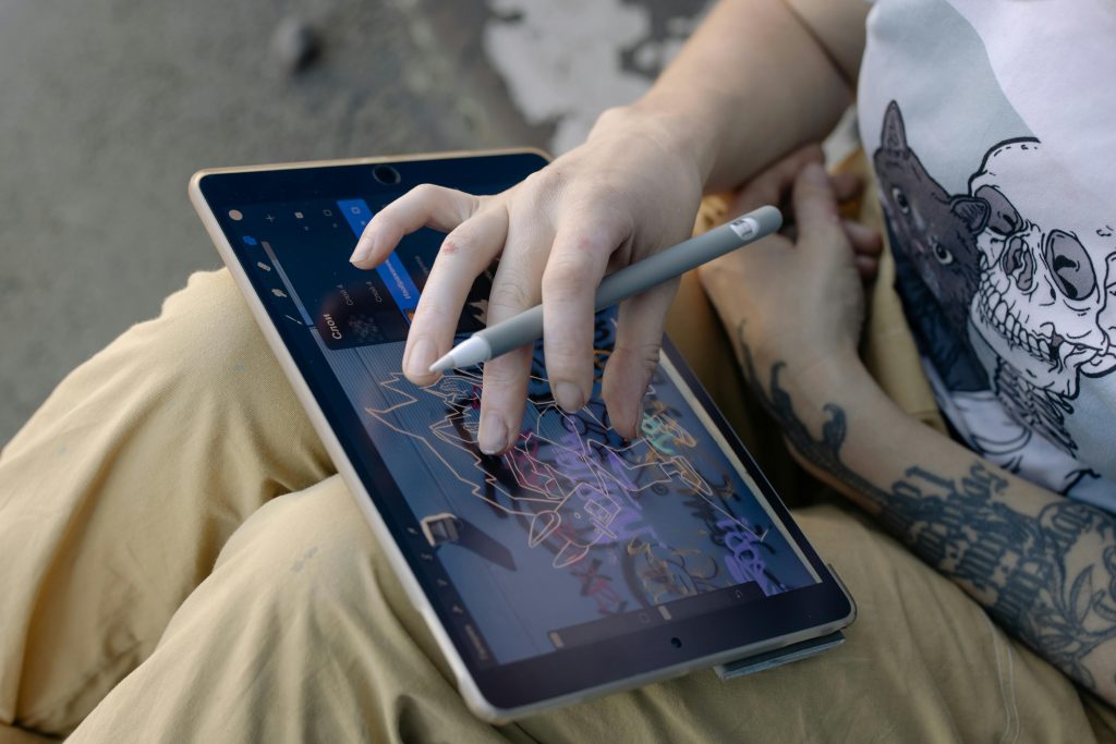 an artist in the process of making a  digital illustration 